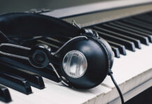 headphones on piano keys