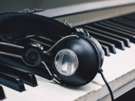 headphones on piano keys