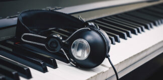 headphones on piano keys