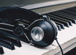 headphones on piano keys